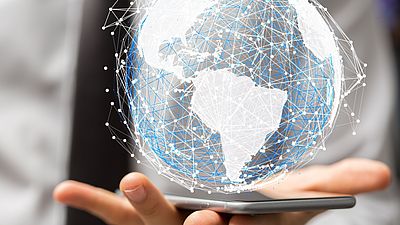 Digital globe above a smartphone